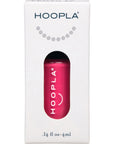 Compact white box packaging with a small window revealing a vibrant pink bottle of Rosy - Clean Nail Polish by HOOPLA, showcasing a clean beauty nail treatment product.