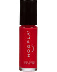 Red nail polish bottle from the Pocket Polish Set - Sun+Sand by HOOPLA, featuring clean beauty, vegan formula for vibrant nail color and nail treatments.
